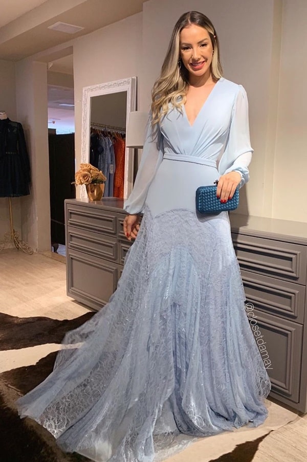 long serenity blue dress with long sleeve and lace application on the skirt