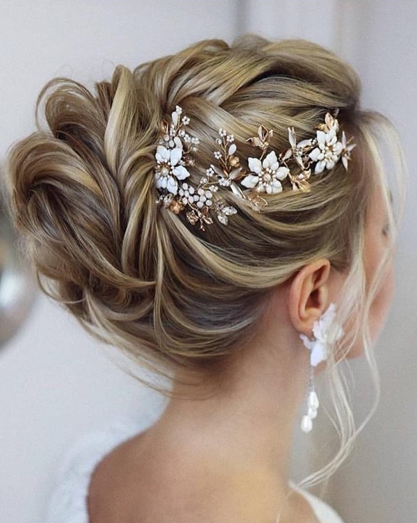 side bun with orchid for bride