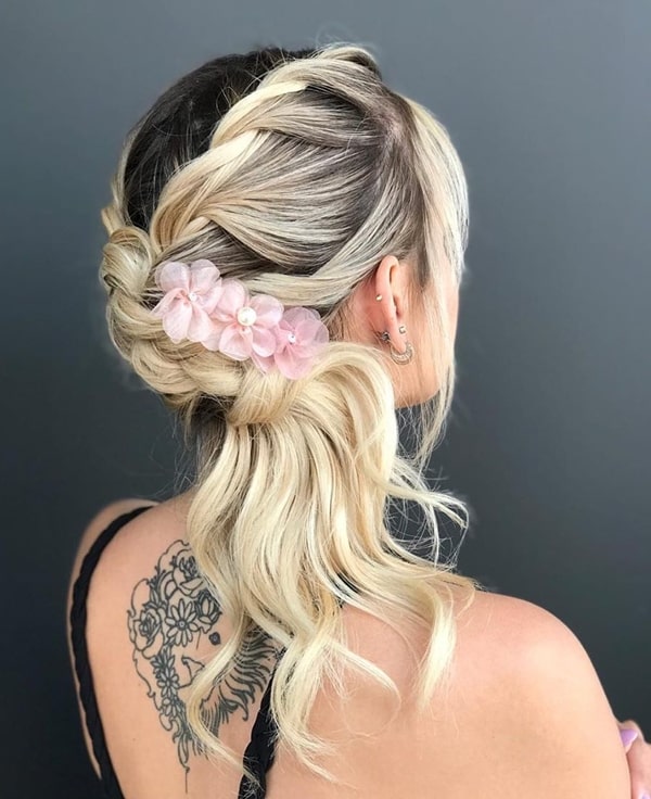 party hairstyle semi fastened with barrette 