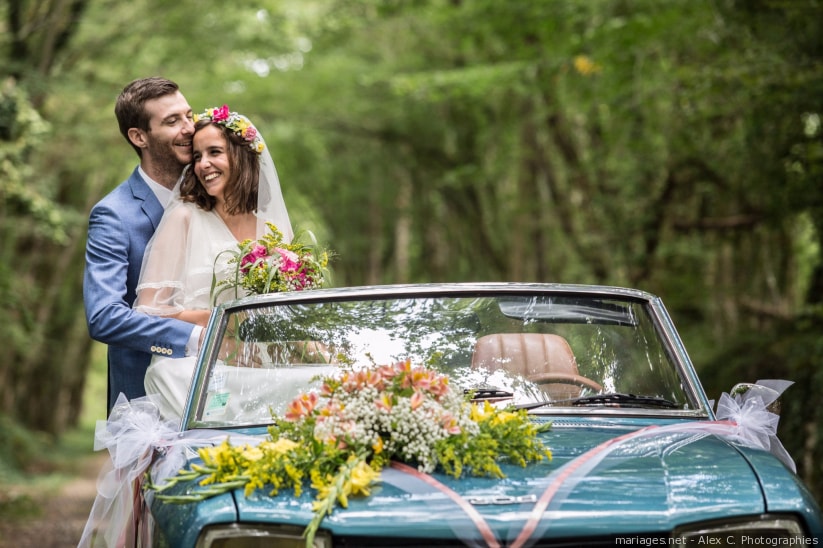 Flower arrangements for the bride and grooms car all