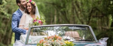 Flower arrangements for the bride and grooms car all