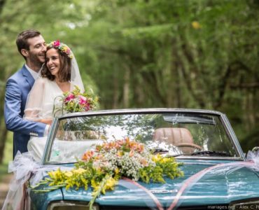 Flower arrangements for the bride and grooms car all