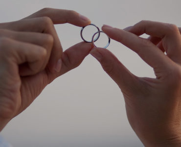 Can a guy wear his wedding ring before marriage?