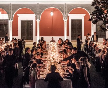 Do I have to invite out-of-town guests to rehearsal dinner?