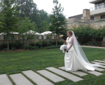 Does mother of bride walk down aisle alone?