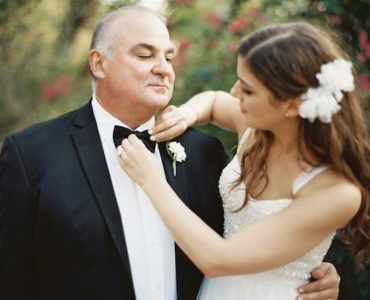 Does the bride's dad wear the same suit?