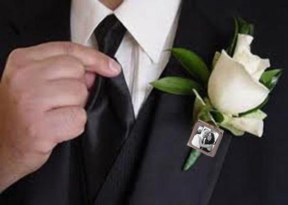 Does the father of the groom get a boutonniere?