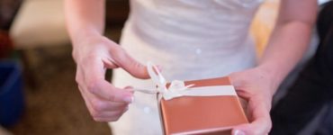 Does the wedding party give the bride and groom a gift?