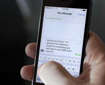 How do I attach a picture to a text message?