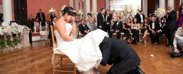 How does the groom take the garter off?