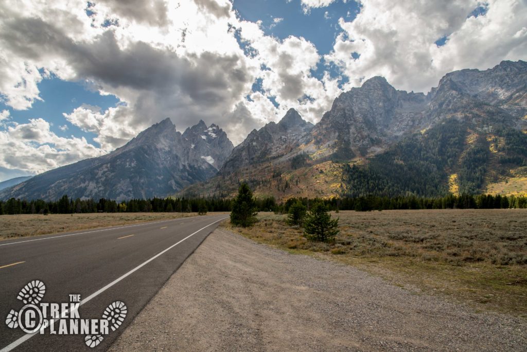 How long is the drive through the Grand Tetons?