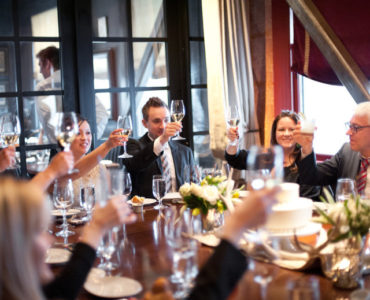 Should out-of-town guests be invited to rehearsal dinner?