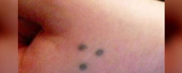 What does 3 dots tattoo mean?