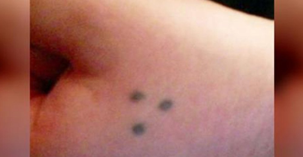 What does 3 dots tattoo mean?