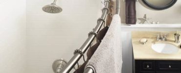 What is the point of a curved shower rod?