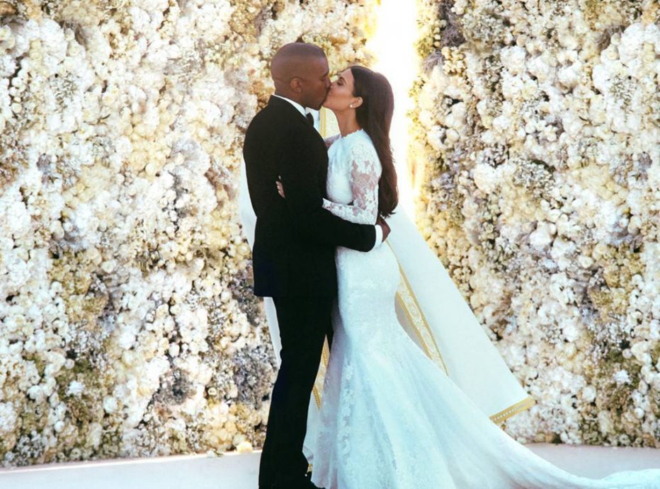 Who designed Kim Kardashian's wedding dress?