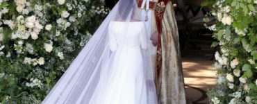 Who designed Meghan Markle's wedding dress?