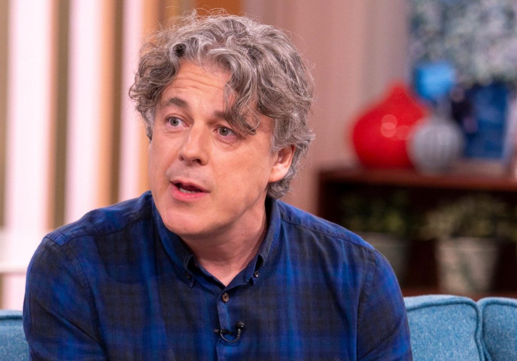 Who does Alan Davies support?