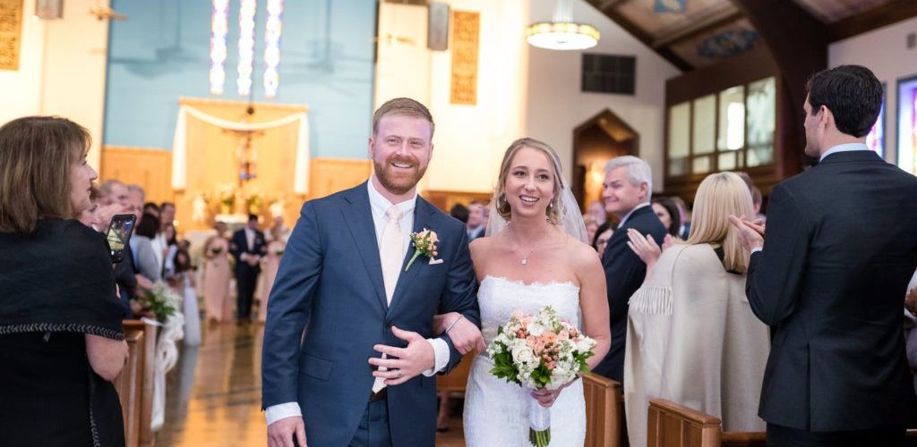 Who is supposed to walk the mother of the groom down the aisle?