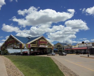 Who owns the Rhythm City Casino in Davenport Iowa?