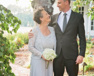 Who walks the groom's mother?