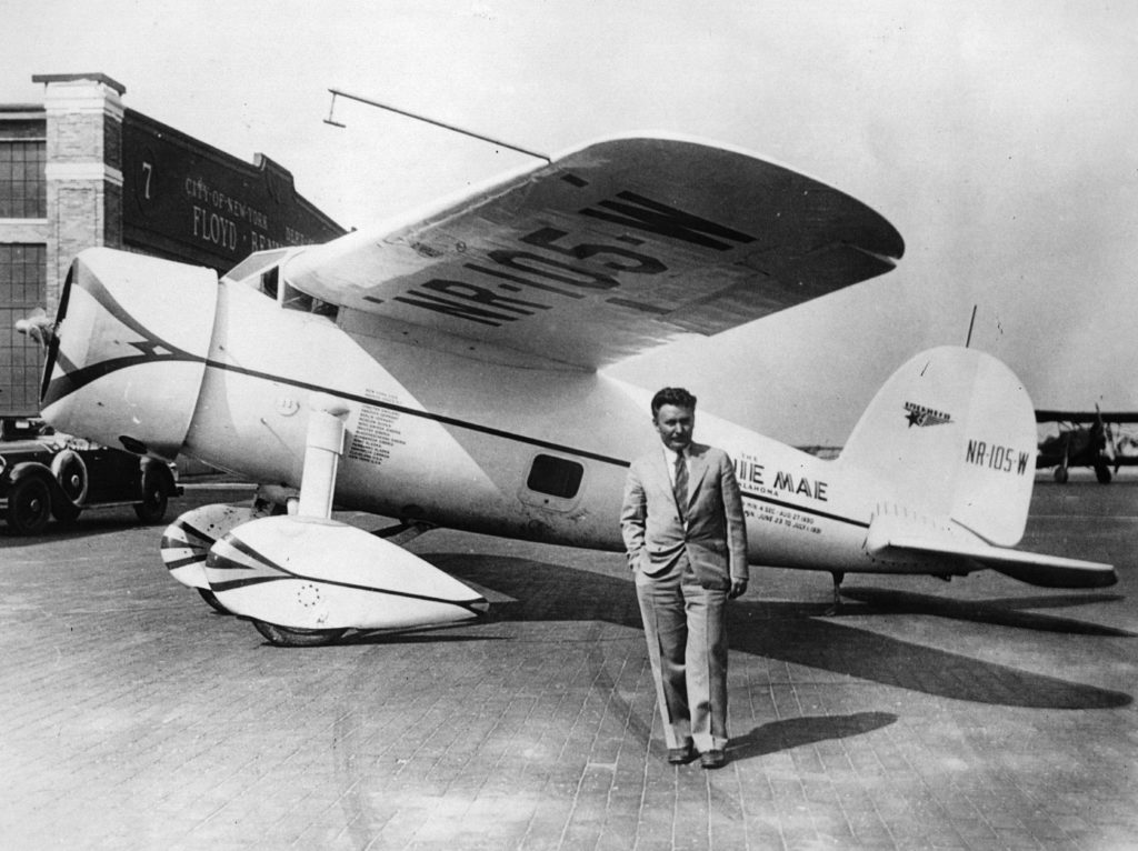 Who was the first person to fly around the world alone?