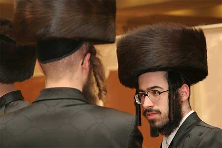 Why do Jews wear big hats?