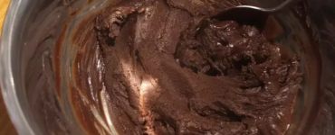 Why do you add butter to melted chocolate?