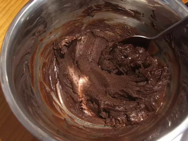 Why do you add butter to melted chocolate?