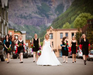 Why does the bride carry a bouquet?