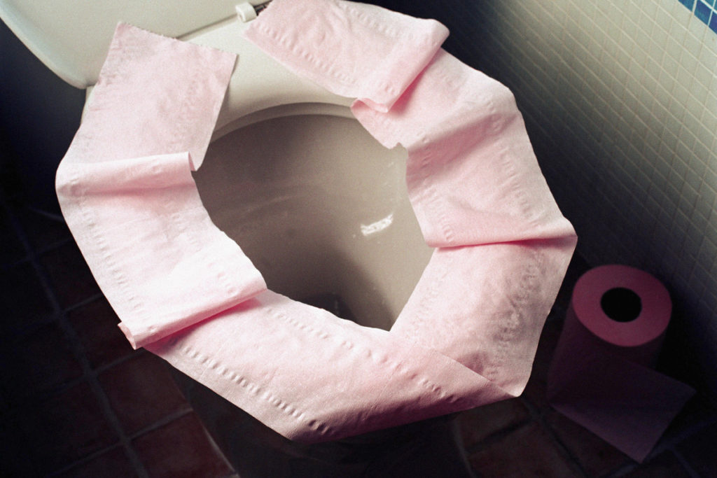 Why you should never put toilet paper on the seat?