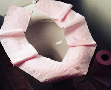 Why you should never put toilet paper on the seat?